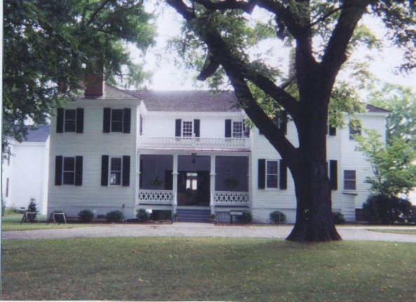 Picture of a two story white clapboard building